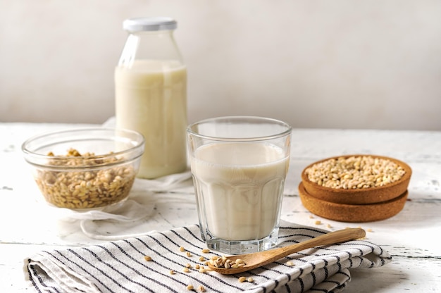 Barley milk in glass with ingredients