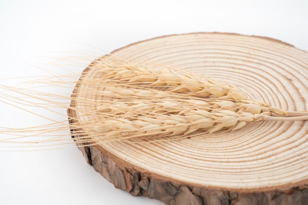 Barley rice with wooden cutting board, white background