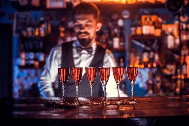 Barman concocts a cocktail on the beerhouse