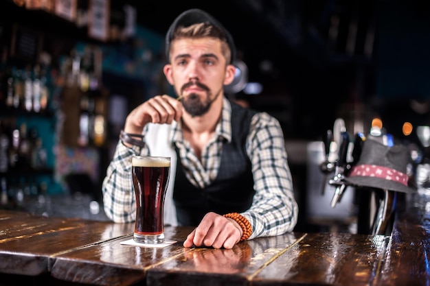 Barman creates a cocktail on the saloon