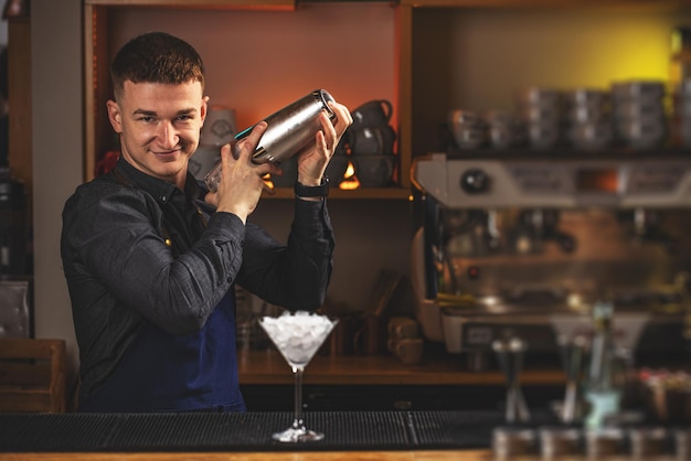 Barman is making cocktail