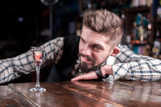 Barman mixes a cocktail on the brasserie