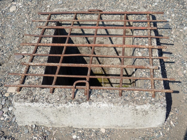 Barred underground entrance Sewer entrance