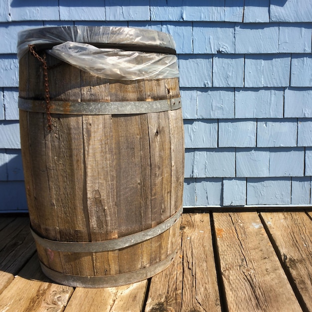 Photo barrel against blue wall