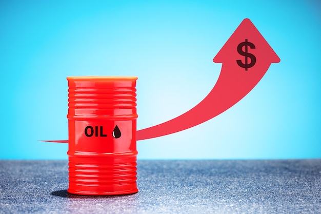 Barrel of oil money and red up arrow Rising crude oil prices concept