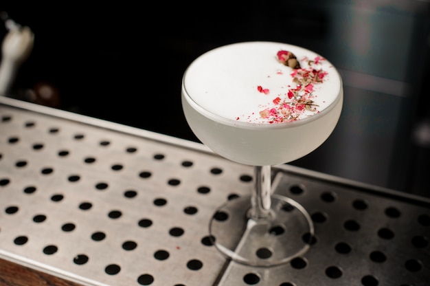 Bartender making a fresh cocktail at the bar