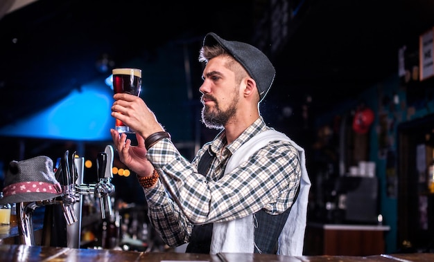 Bartender mixes a cocktail in the saloon