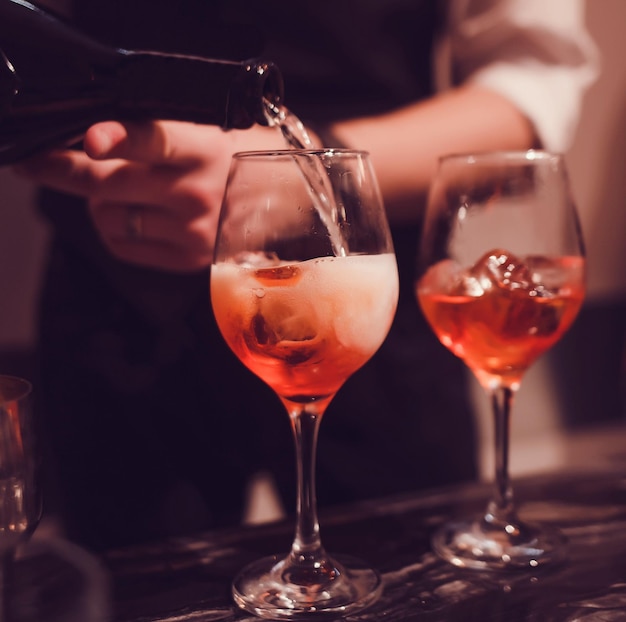 Bartender pouring champagne