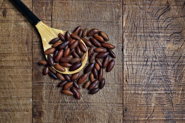 Baru chestnut on the rustic wooden table