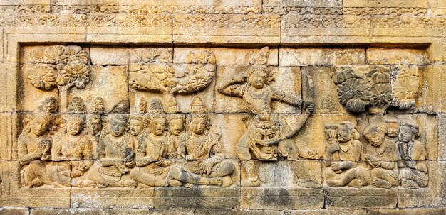 Photo bas relief of borobudur temple in yogyakarta indonesia