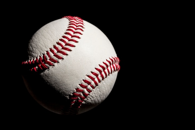 Baseball Ball closeup on a black Background