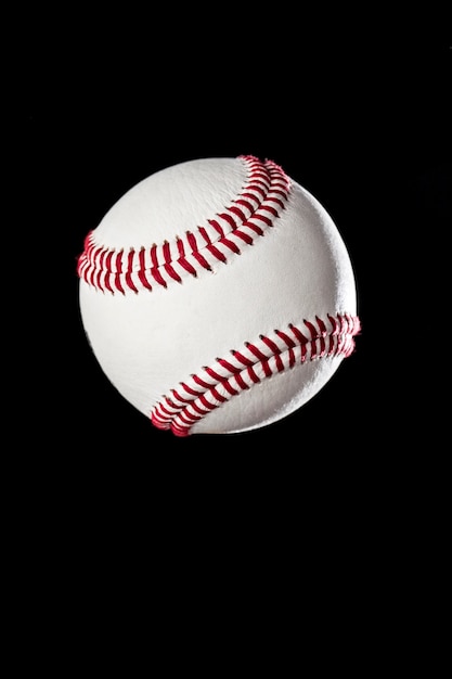 Baseball Ball closeup on a black wall