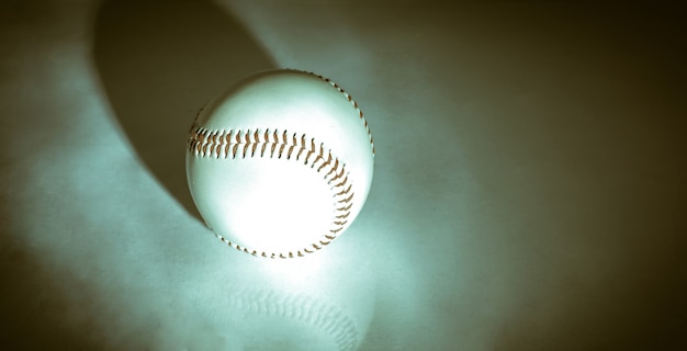 Photo baseball ball with red stitches .isolated on a white