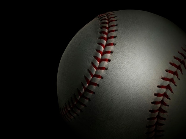 Baseball on black background