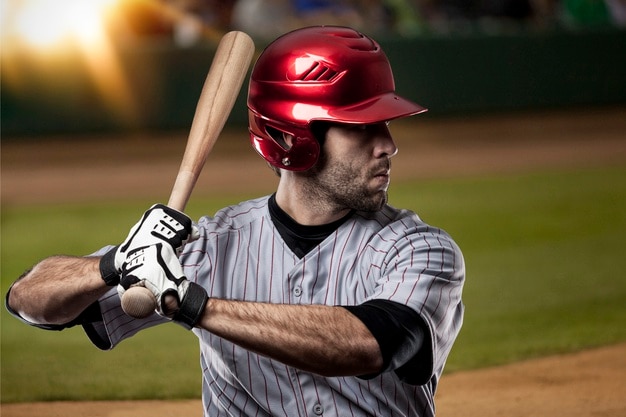 Baseball Player on a baseball Stadium.