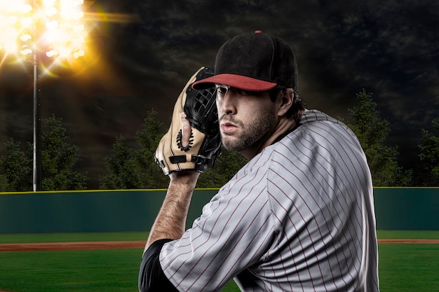 Baseball Player on a baseball Stadium.