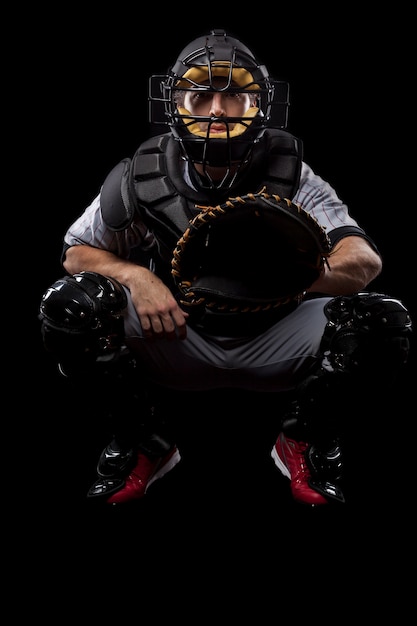 Baseball Player, catcher waiting a ball,  . Studio Shot.