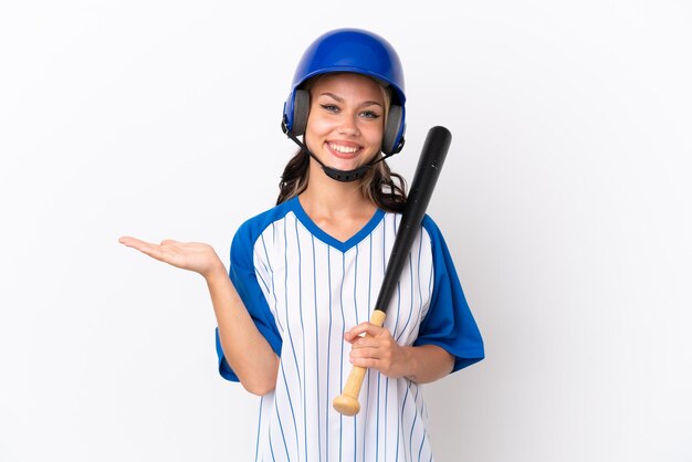 Baseball Russian girl player with helmet and bat isolated on white background with shocked facial expression