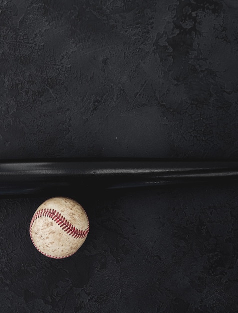 Baseball and wooden bat