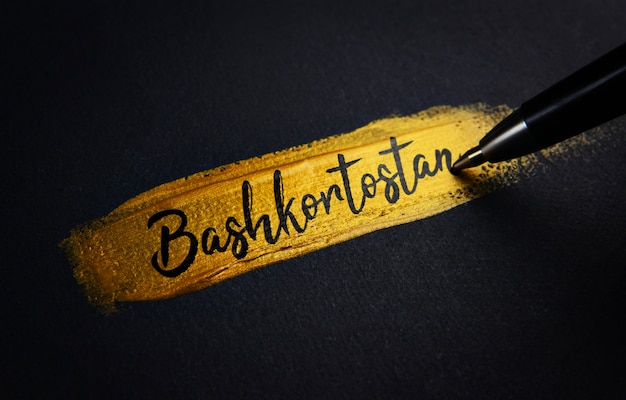 Bashkortostan Handwriting Text on Golden Paint Brush Stroke