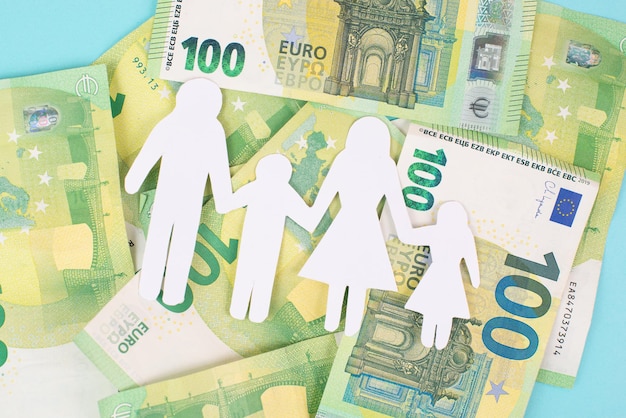 Basic child benefit family and money Euro banknotes new regulation against poverty social issue