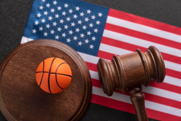 Basket ball Judge gavel and the flag of United States of America Sport betting concept Basketball betting in USA