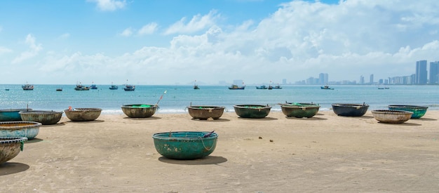 Basket boats at My Khe beach in Da Nang city Vietnam Local fishing boats of Danang have become iconic to Vietnam Southeast Asia travel concept