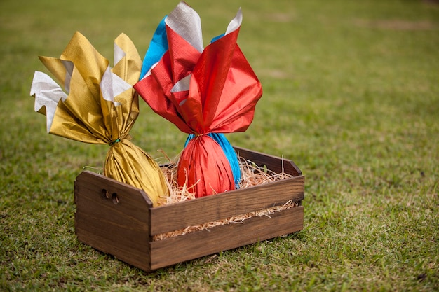 basket of brazilian Easters eggs on the grass