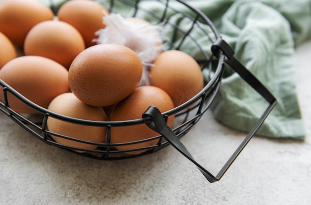 Basket of fresh brown eggs