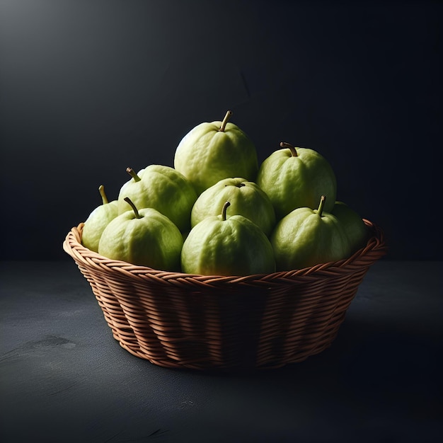 Basket of green guavas on dark surface black background