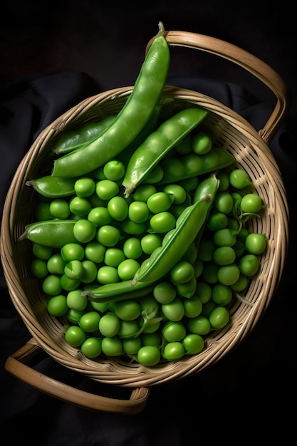 A basket of green peas sits on a black cloth.