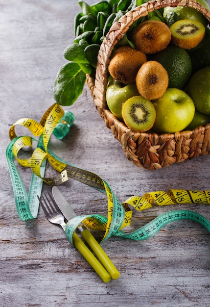 Basket of green Summer fruit and vegetables.