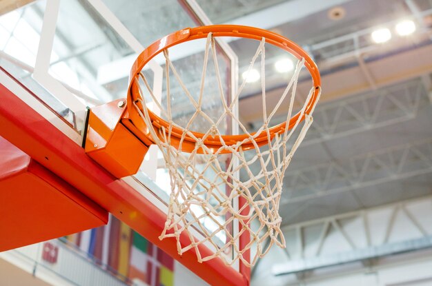 Basket and network under the lights of the hall