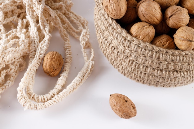 basket for nuts on a white background macro