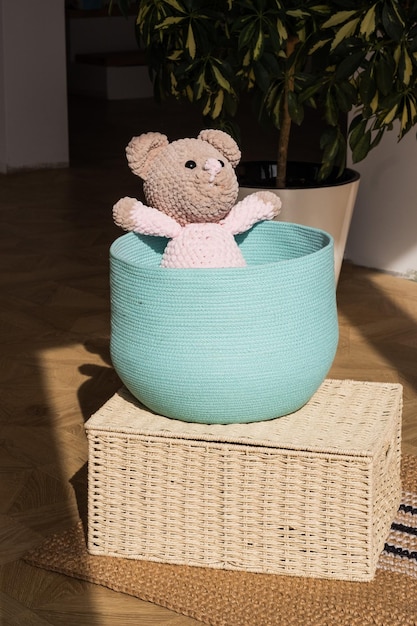 Basket organizer interior knitted for organizing home space and\
storage. handmade wicker basket.