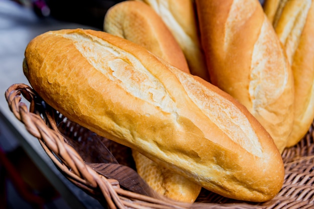 Basket with bread on the table. Bakery.