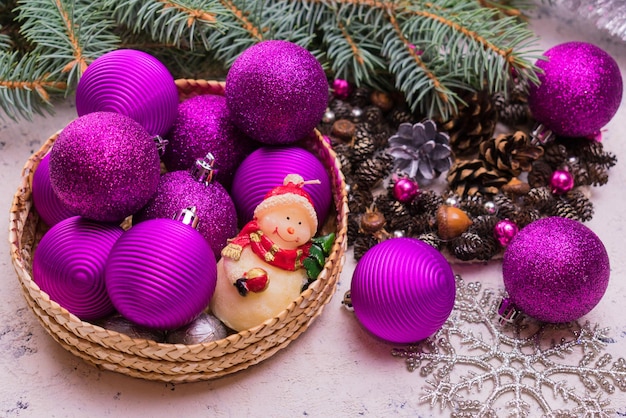 Basket with Christmas decorations Concept of preparation for Christmas