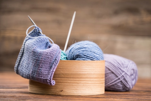 Basket with colored wool yarn