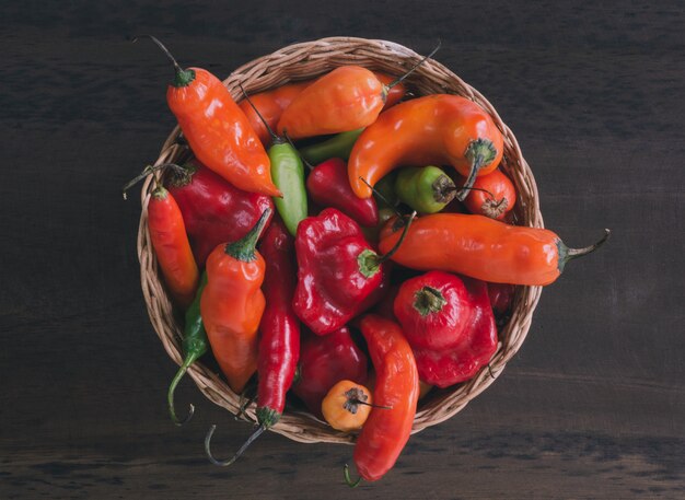 Basket with colorful peppers. 