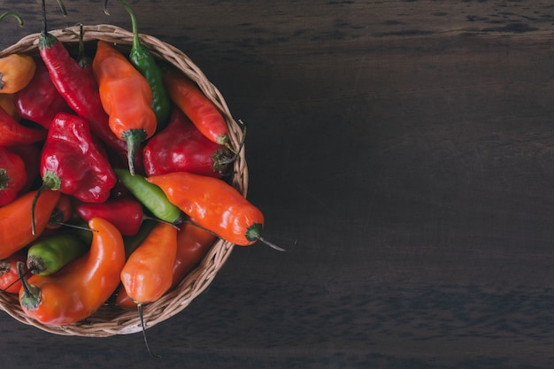 Basket with colorful peppers. 