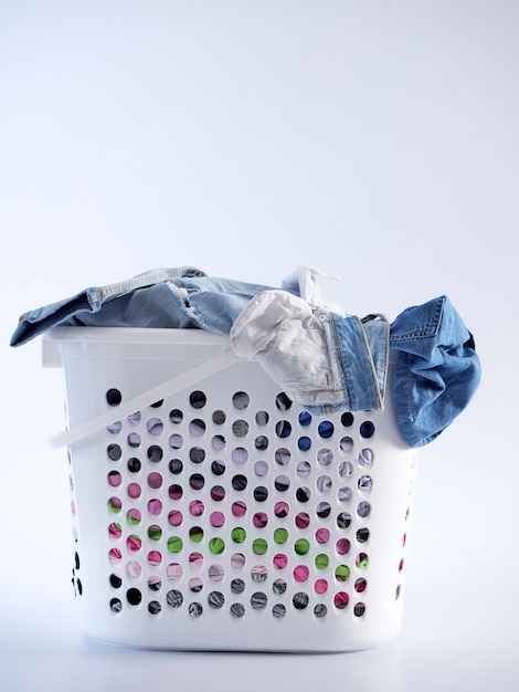 Basket with dirty clothes for washing