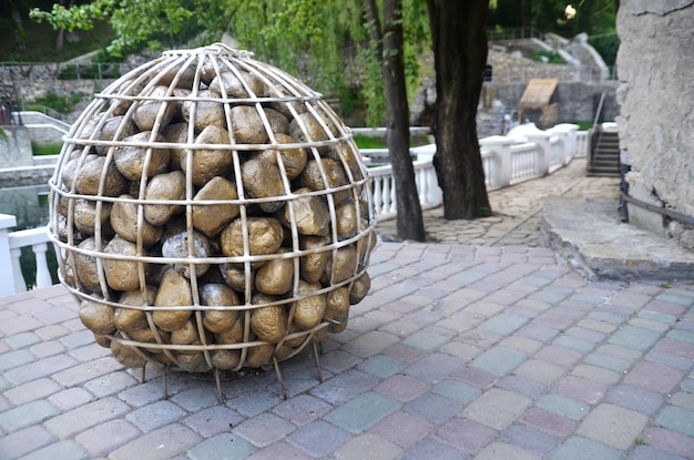 Basket with stones monument