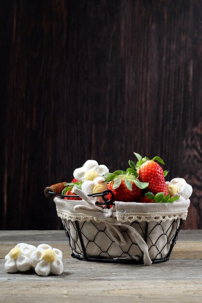 Basket with strawberries and mashmallows