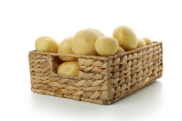 Basket of young potato isolated on white background