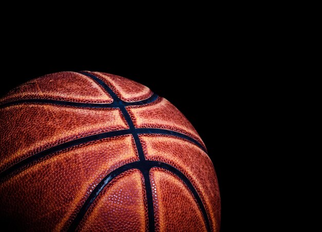 Basketball ball on black background