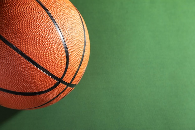 Basketball ball on the green table