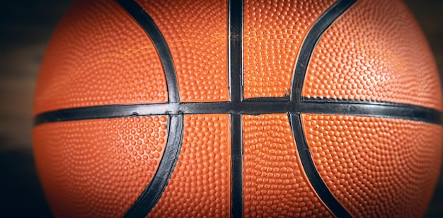 Basketball ball on the wooden table