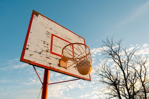 Basketball passes through the hoop