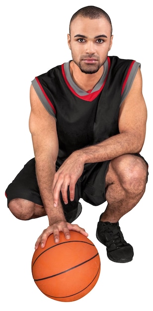 Basketball Player Crouch Down with a Ball - Isolated