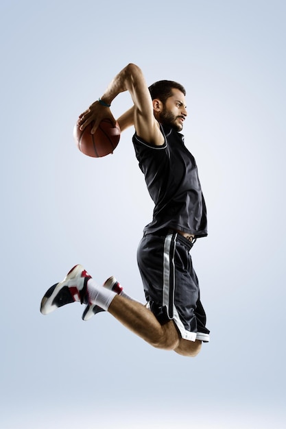 Basketball player isolated on white